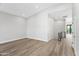 Bright bedroom with hardwood floors and modern staircase at 21480 N 56Th Ave, Glendale, AZ 85308