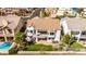Back aerial view of two-story home with manicured lawn and backyard, set in a scenic neighborhood at 21480 N 56Th Ave, Glendale, AZ 85308