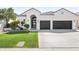 Charming single-story home features a two-car garage, arched entryway, and well-manicured lawn at 21480 N 56Th Ave, Glendale, AZ 85308