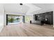 Modern kitchen with sleek black cabinets, marble countertops, and a stunning view of the water at 21480 N 56Th Ave, Glendale, AZ 85308