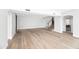Spacious living area featuring an open staircase and bright, natural light at 21480 N 56Th Ave, Glendale, AZ 85308
