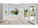 Bright living space with bay windows offering scenic views of the water and golf course at 21480 N 56Th Ave, Glendale, AZ 85308