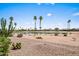 Backyard with a view of the golf course and water feature at 2163 N 164Th Dr, Goodyear, AZ 85395