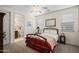Comfortable bedroom with connecting bath, a ceiling fan, and ample natural light at 2163 N 164Th Dr, Goodyear, AZ 85395