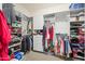 Spacious walk-in closet with shelving and hanging racks for organized storage at 2163 N 164Th Dr, Goodyear, AZ 85395
