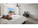 Spacious main bedroom with a view, seating, and carpet at 2163 N 164Th Dr, Goodyear, AZ 85395