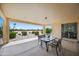 Covered patio with outdoor seating area at 2163 N 164Th Dr, Goodyear, AZ 85395