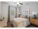 Cozy bedroom with ceiling fan, and warm lighting at 22650 N Lynn St, Maricopa, AZ 85138