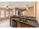 Bright kitchen area with ample counter space and breakfast bar seating at 2541 N 86Th Ave, Phoenix, AZ 85037