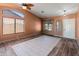 Open living room featuring high ceilings, neutral colors and tile flooring at 2541 N 86Th Ave, Phoenix, AZ 85037