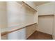 Spacious walk-in closet with shelving and ample storage space at 2541 N 86Th Ave, Phoenix, AZ 85037