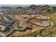 Scenic aerial of community featuring new home construction, custom lots, and picturesque mountain views at 27358 N 69Th Dr, Peoria, AZ 85383