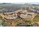 Expansive aerial view of a new community development with mountain views and custom home sites at 27358 N 69Th Dr, Peoria, AZ 85383