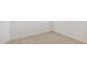 Cozy carpeted bedroom corner featuring fresh white trim, baseboards and electrical outlets at 27358 N 69Th Dr, Peoria, AZ 85383