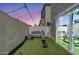 Outdoor space with artificial turf, gym equipment, and privacy wall for fitness and relaxation at 3034 N 39Th St # 12, Phoenix, AZ 85018