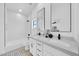 Modern bathroom featuring a double vanity with sleek fixtures and a shower-tub combination at 3034 N 39Th St # 12, Phoenix, AZ 85018