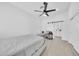 Spacious bedroom with ceiling fan and bathroom access at 3034 N 39Th St # 12, Phoenix, AZ 85018