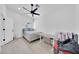 Cozy bedroom with ceiling fan and bright lighting at 3034 N 39Th St # 12, Phoenix, AZ 85018