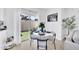 Cozy dining area featuring a round table with stylish chairs and backyard access at 3034 N 39Th St # 12, Phoenix, AZ 85018