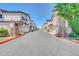 Street view featuring multiple townhomes with private garages and manicured front yards at 3034 N 39Th St # 12, Phoenix, AZ 85018