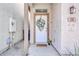 Charming front entrance with a decorative wreath and 'Home' welcome mat at 3034 N 39Th St # 12, Phoenix, AZ 85018