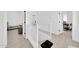 Bright hallway with white banister and access to bedrooms at 3034 N 39Th St # 12, Phoenix, AZ 85018