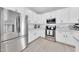Well-equipped kitchen with stainless steel refrigerator, oven, and microwave at 3034 N 39Th St # 12, Phoenix, AZ 85018