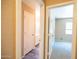 Hallway leading to a bathroom and bedroom at 310 E Payton St, San Tan Valley, AZ 85140