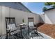 Private backyard patio with shade, seating, and privacy wall at 3102 E Mariposa St, Phoenix, AZ 85016