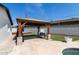 Backyard featuring a gazebo with outdoor seating and view of the pool at 3102 E Mariposa St, Phoenix, AZ 85016