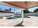Well-manicured backyard featuring a swimming pool and outdoor seating area at 3102 E Mariposa St, Phoenix, AZ 85016
