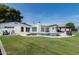 Aerial view of a backyard featuring a pool, gazebo, outdoor seating and lush lawn at 3102 E Mariposa St, Phoenix, AZ 85016