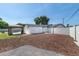 This backyard features a pool with gazebo and a charming detached structure against a light blue sky at 3102 E Mariposa St, Phoenix, AZ 85016