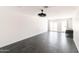 Bonus room with slider to the backyard has a modern light fixture at 3102 E Mariposa St, Phoenix, AZ 85016
