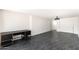 Bonus room features dark tile and storage with sliding closet doors at 3102 E Mariposa St, Phoenix, AZ 85016
