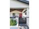 Close-up of the home's entrance, showcasing the decorative gate and inviting red door at 3102 E Mariposa St, Phoenix, AZ 85016