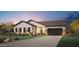Charming single-story home with well-manicured lawn and modern architectural details at 3332 W Sunstone Dr, San Tan Valley, AZ 85144