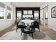 Bright main bedroom with a barn door, stylish seating area, and elegant decor at 3390 W Sunstone Dr, San Tan Valley, AZ 85144