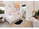Charming bedroom features pink accents, a plush bed, furry rug and stylish decor at 3419 W Sunstone Dr, San Tan Valley, AZ 85144
