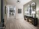 Light and airy entryway featuring sleek console table and designer mirror at 3419 W Sunstone Dr, San Tan Valley, AZ 85144