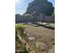 A large, grassy backyard features a playset with swings and slide at 344 E Aepli Dr, Tempe, AZ 85282