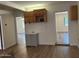 A light and airy dining area featuring neutral colors and a storage cabinet at 344 E Aepli Dr, Tempe, AZ 85282