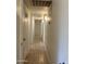 A well-lit hallway featuring tile floors and simple decor at 344 E Aepli Dr, Tempe, AZ 85282