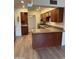 Bright kitchen features wood cabinets, stone countertops, and stainless steel appliances at 344 E Aepli Dr, Tempe, AZ 85282