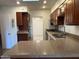 Kitchen featuring granite countertops and modern appliances at 344 E Aepli Dr, Tempe, AZ 85282