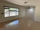 Bright living room with tile floor and large windows offering great views at 344 E Aepli Dr, Tempe, AZ 85282