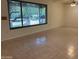 Sunny living room with nice tile floors and a bright window at 344 E Aepli Dr, Tempe, AZ 85282