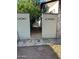 A decorative entry way with brick columns leads to the side yard of the property at 344 E Aepli Dr, Tempe, AZ 85282