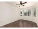 Bedroom featuring wood floors and a ceiling fan, creating a cozy atmosphere at 3633 N 3Rd Ave # 2031, Phoenix, AZ 85013