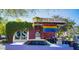Unique coffee shop with colorful decor and vintage vehicles, offering a local community vibe at 3633 N 3Rd Ave # 2031, Phoenix, AZ 85013